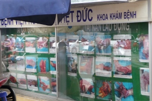 Display case with graphic photos of injured people